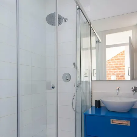 Amidst The Rooftops Of Апартаменты