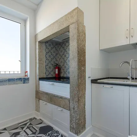 Amidst The Rooftops Of *