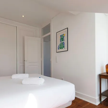 Amidst The Rooftops Of Лісабон