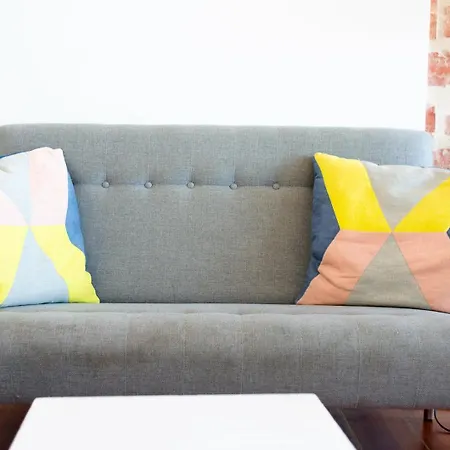 Amidst The Rooftops Of Апартаменти *